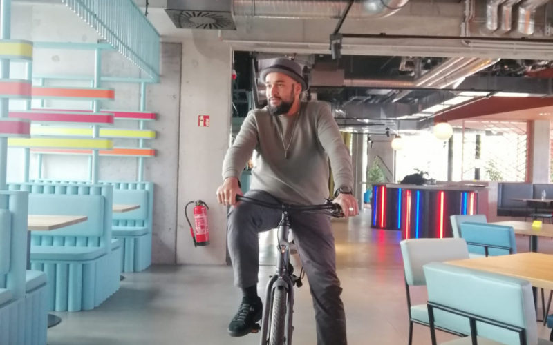 A man sat on a bicycle