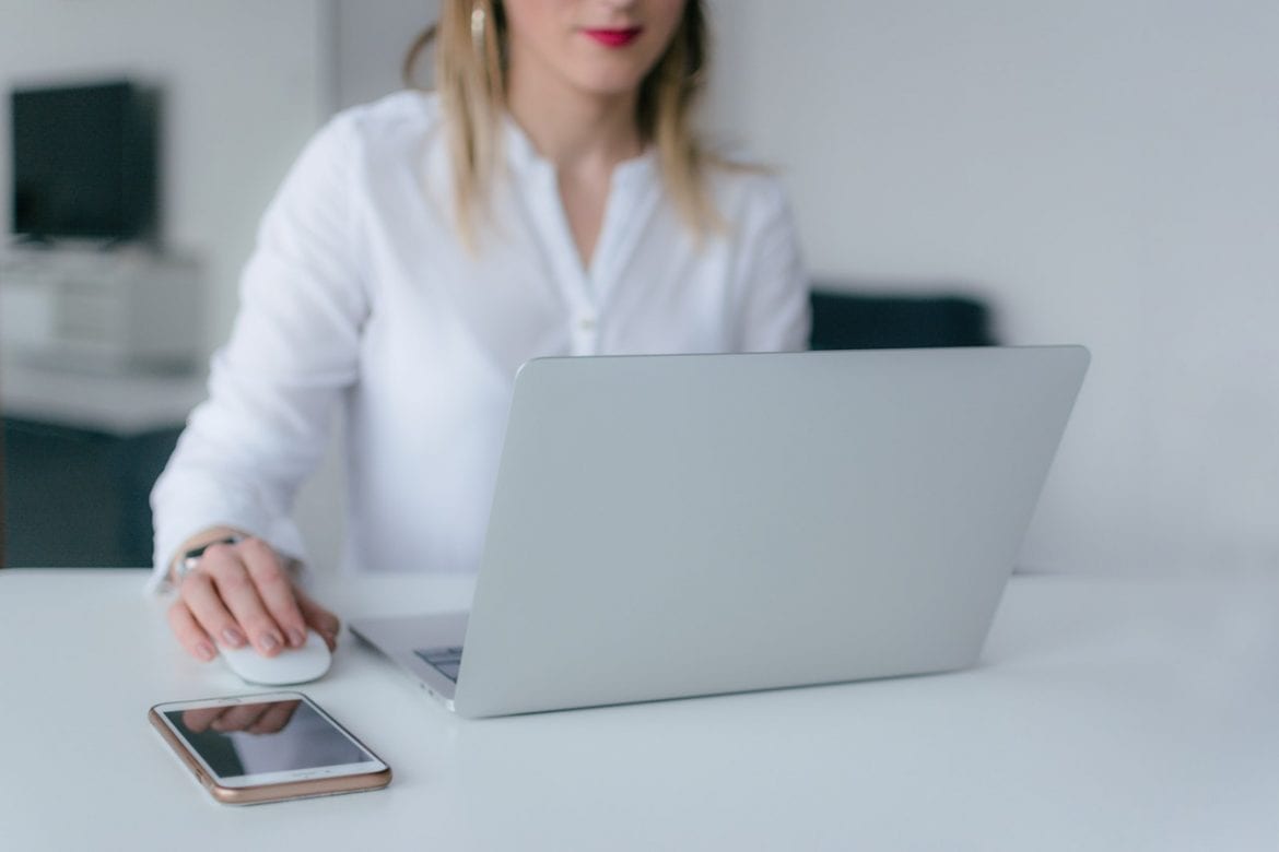 Woman sat at a computer