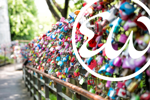 The EventWell logo superimposed over a bike locks chained to a fence