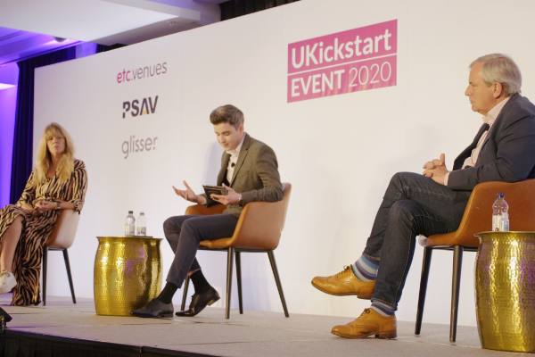 UKickstart main panel, two men and a woman sat on a stage