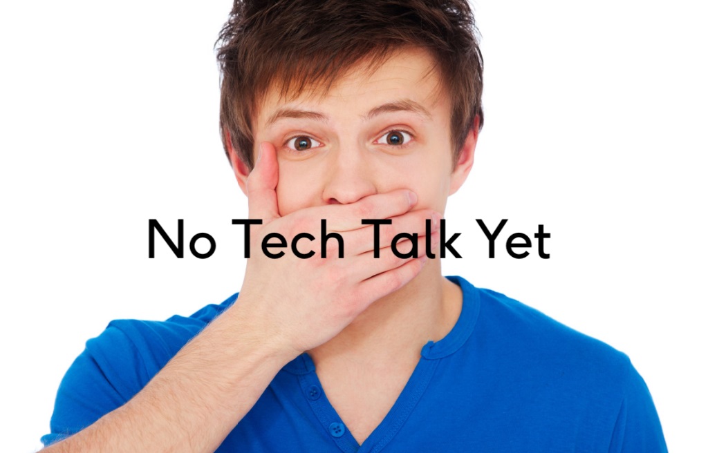 man covering his mouth.