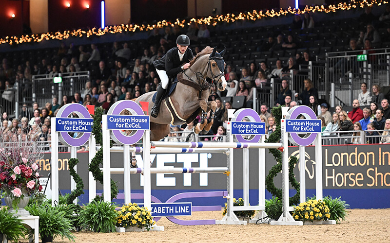 Alexander McLean riding Gino F winner of The Yeti Under 25 British Show Jumping Championship at The London International Horse Show at ExCel in London on the 12 December 2023
