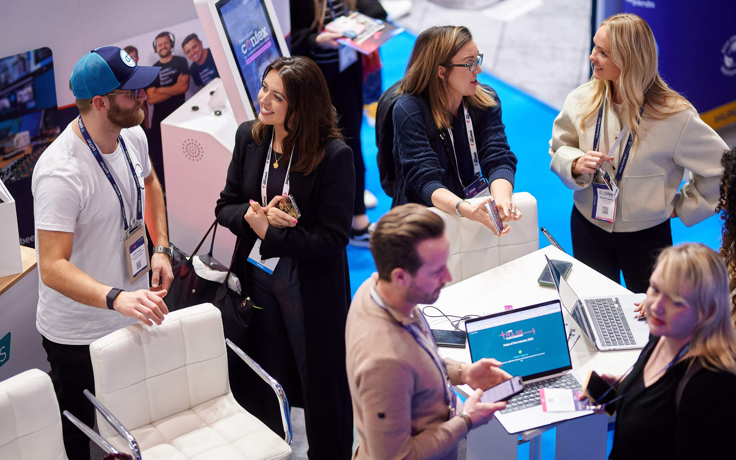 People talking at International Confex