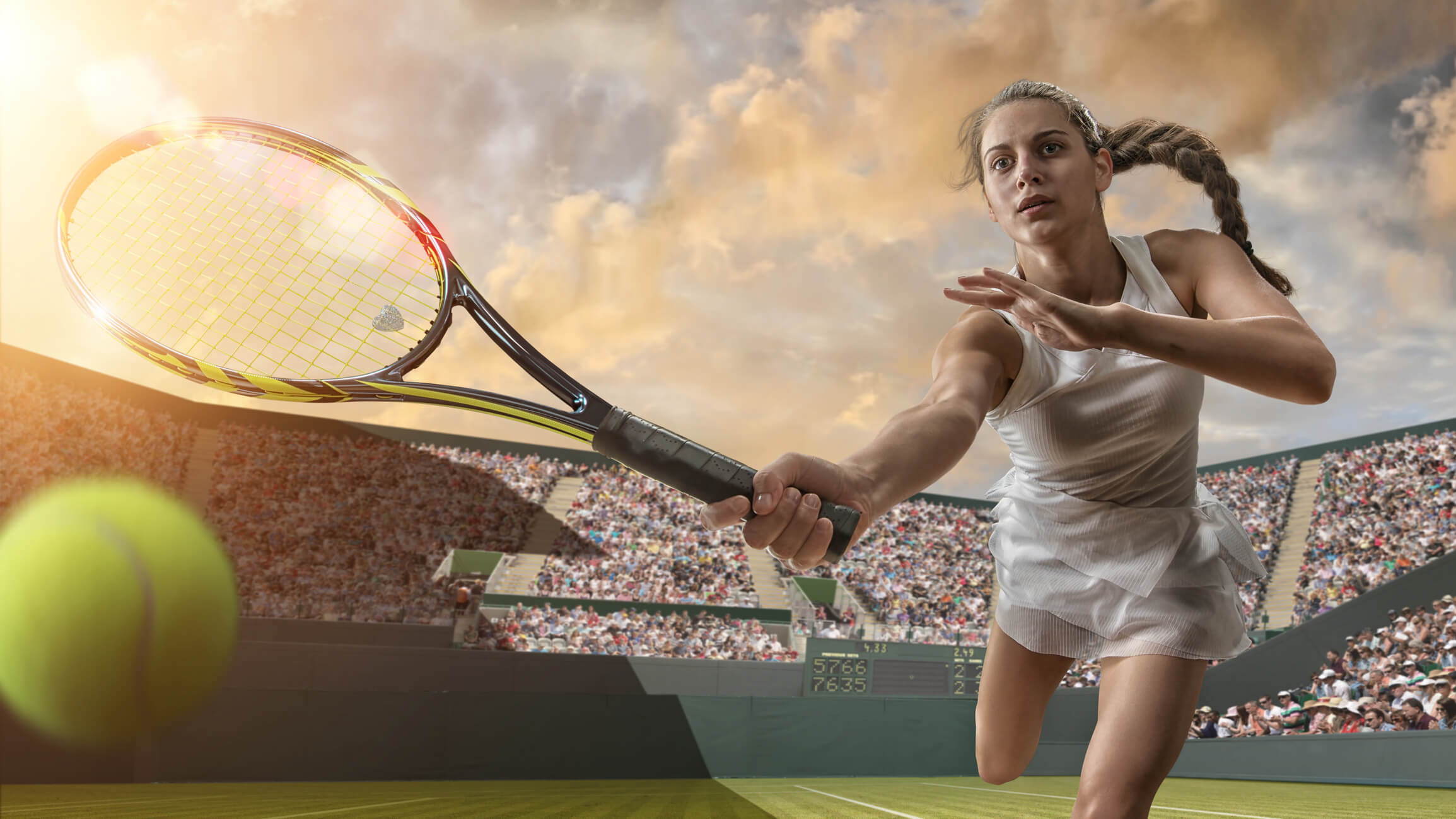 Female Tennis Player About To Strike Ball