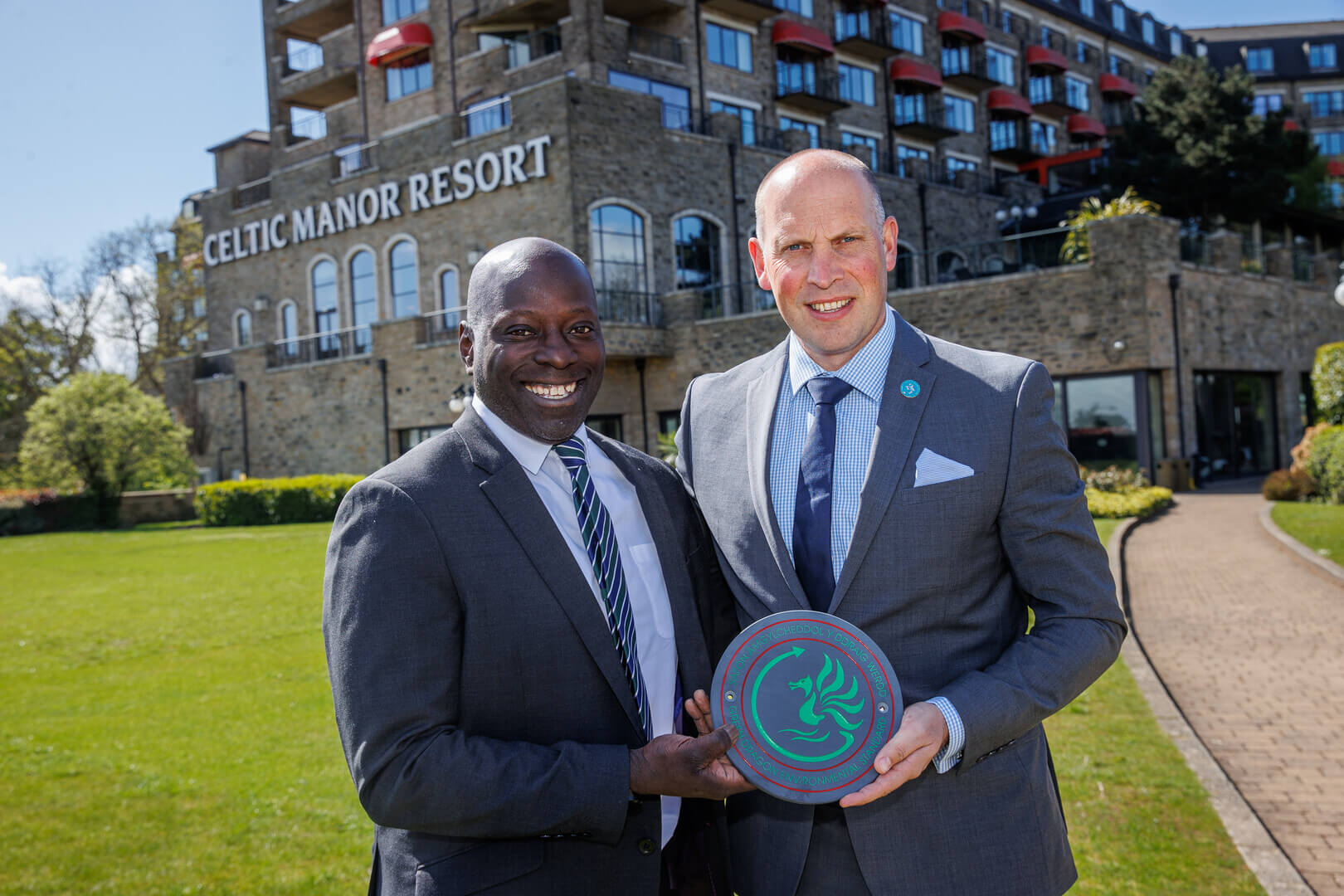 Celtic-Collection-Energy-and-Environment-Manager-Fitzroy-Hutchinson-and-Celtic-Manor-Resort-Operations-Director-David-Griffin-with-the-Green-Dragon-Level-4-Environmental-Standard.jpg
