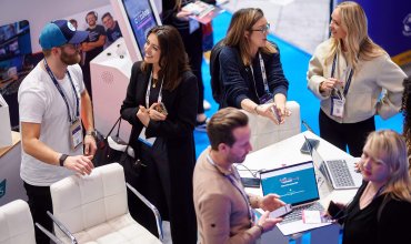People talking at International Confex