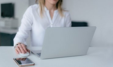 Woman sat at a computer